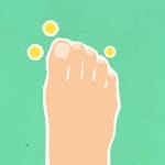 Top view of decorative cardboard illustration representing foot and microbes causing fungal disease on green background