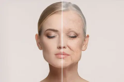 Woman with glowing youthful skin demonstrating an anti-aging skincare routine using retinol, peptides and sunscreen.