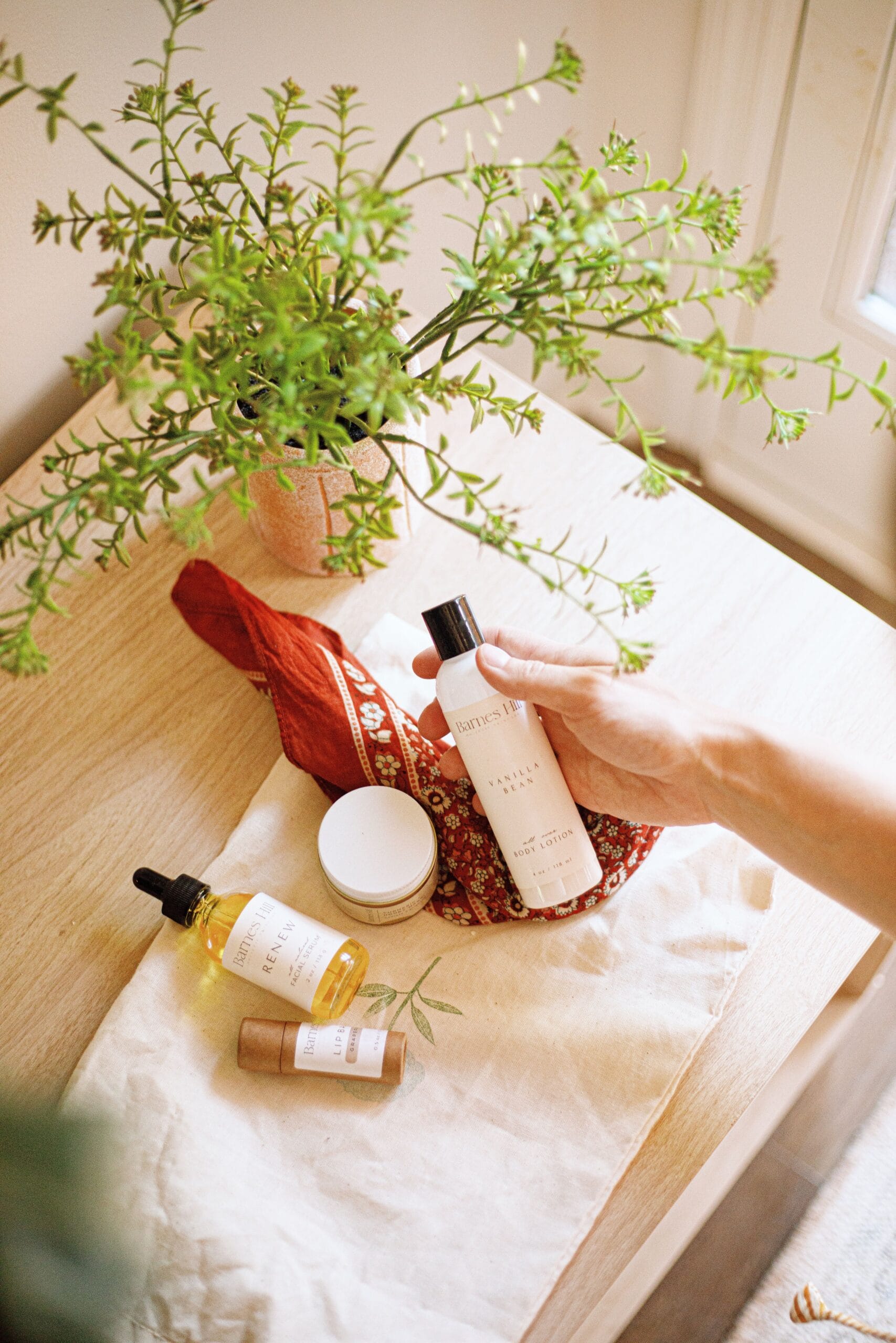 Sunscreen bottle for acne-prone skin flatlay